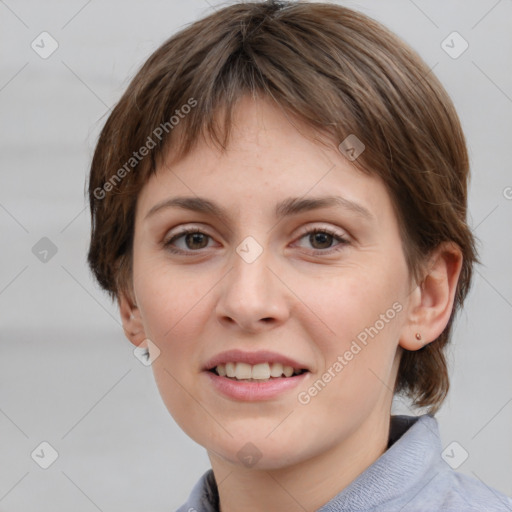 Joyful white young-adult female with medium  brown hair and grey eyes