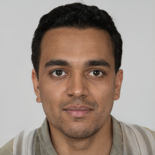 Neutral latino young-adult male with short  black hair and brown eyes