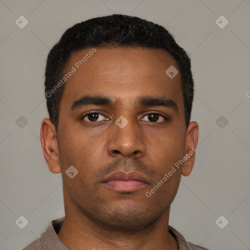 Neutral latino young-adult male with short  brown hair and brown eyes