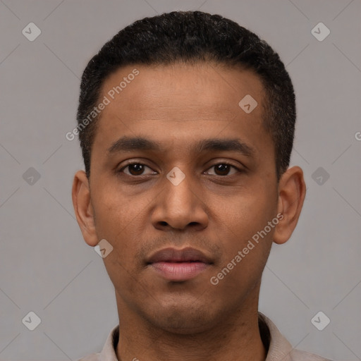 Neutral latino young-adult male with short  black hair and brown eyes