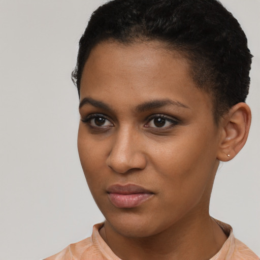 Neutral black young-adult female with short  brown hair and brown eyes