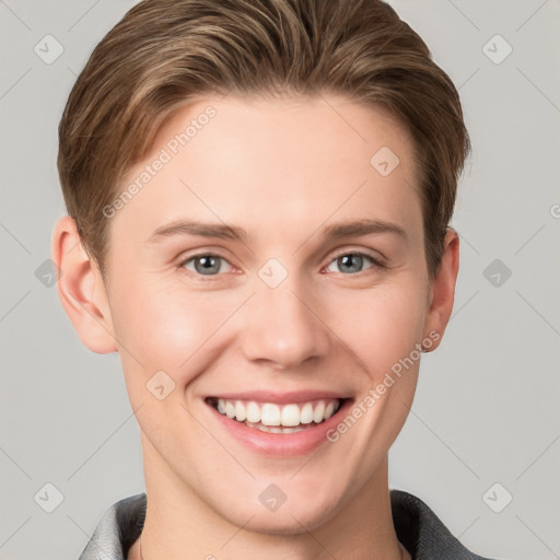 Joyful white young-adult female with short  brown hair and grey eyes