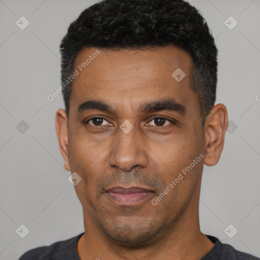 Neutral latino adult male with short  black hair and brown eyes