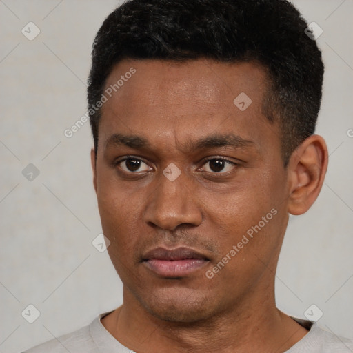 Neutral black young-adult male with short  black hair and brown eyes