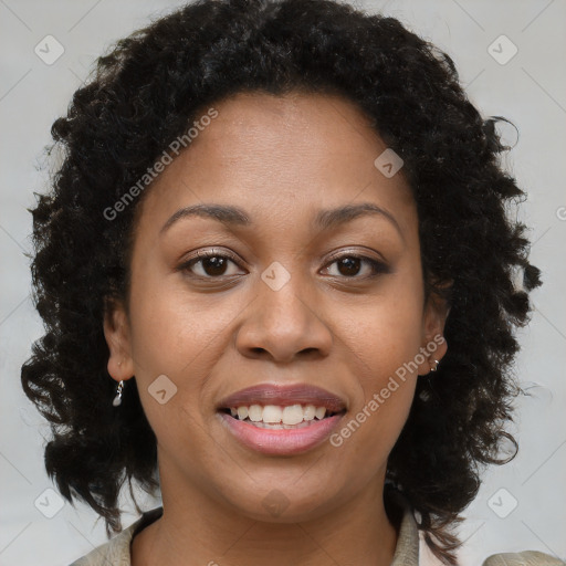 Joyful black young-adult female with medium  brown hair and brown eyes