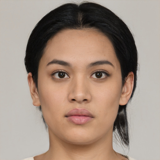 Neutral latino young-adult female with medium  black hair and brown eyes