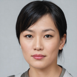 Neutral asian young-adult female with medium  black hair and brown eyes