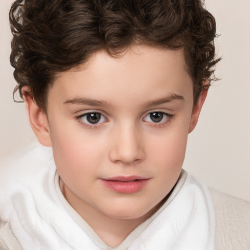 Joyful white child female with short  brown hair and brown eyes