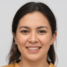 Joyful white young-adult female with medium  brown hair and brown eyes