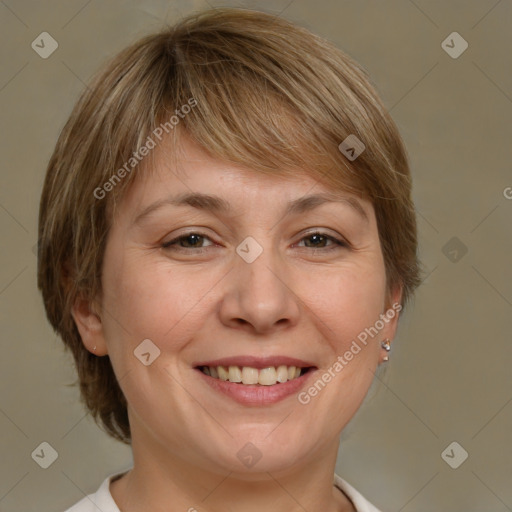 Joyful white adult female with medium  brown hair and brown eyes