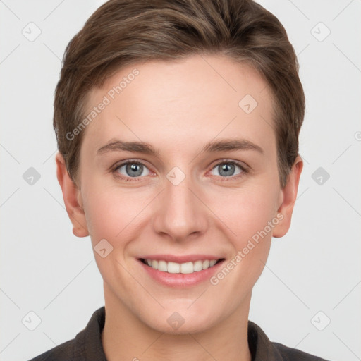 Joyful white young-adult female with short  brown hair and grey eyes