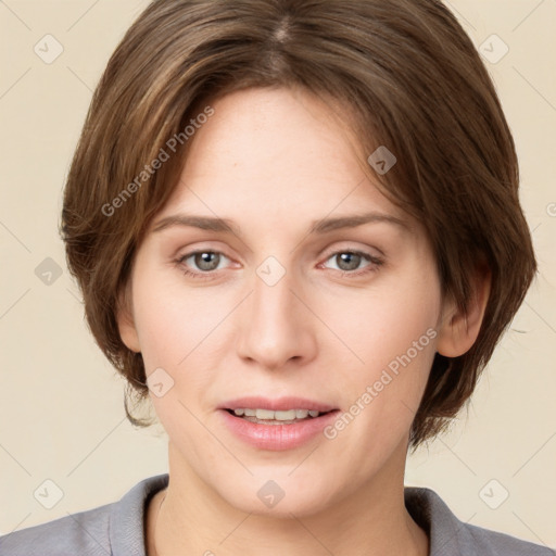 Joyful white young-adult female with medium  brown hair and grey eyes