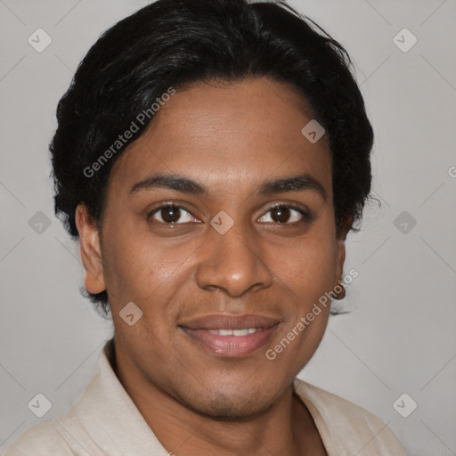 Joyful latino young-adult male with short  brown hair and brown eyes