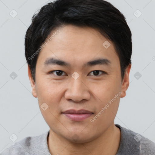 Joyful white young-adult male with short  black hair and brown eyes