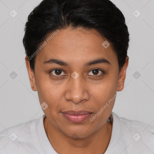 Joyful latino young-adult female with short  black hair and brown eyes