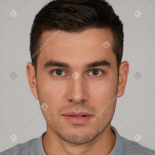 Neutral white young-adult male with short  brown hair and brown eyes