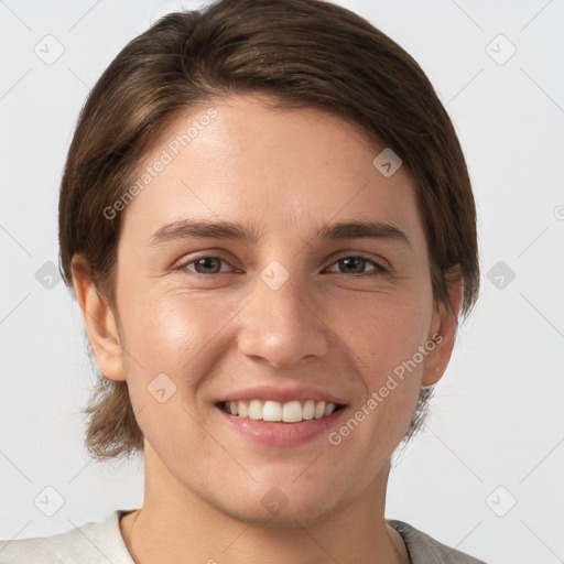 Joyful white young-adult female with medium  brown hair and grey eyes