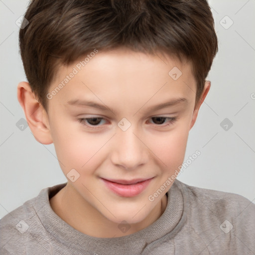 Joyful white child male with short  brown hair and brown eyes