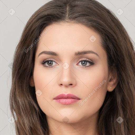 Neutral white young-adult female with long  brown hair and brown eyes