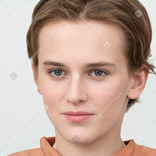 Joyful white young-adult female with short  brown hair and grey eyes