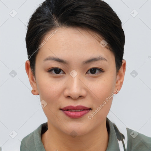 Joyful asian young-adult female with short  brown hair and brown eyes