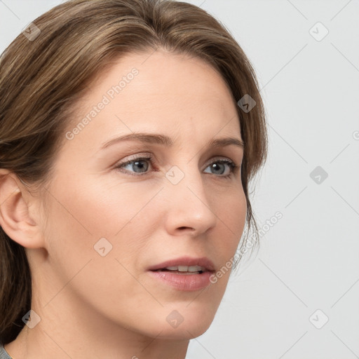 Neutral white young-adult female with medium  brown hair and grey eyes