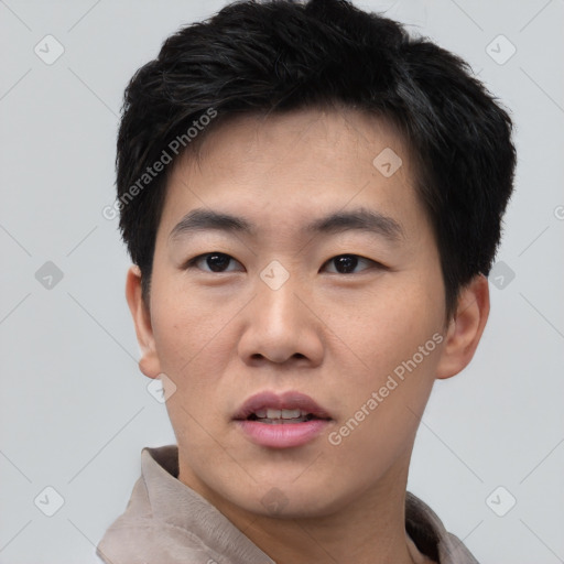 Neutral asian young-adult male with short  black hair and brown eyes