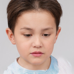 Neutral white child female with short  brown hair and brown eyes