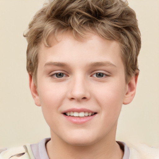 Joyful white child male with short  brown hair and brown eyes