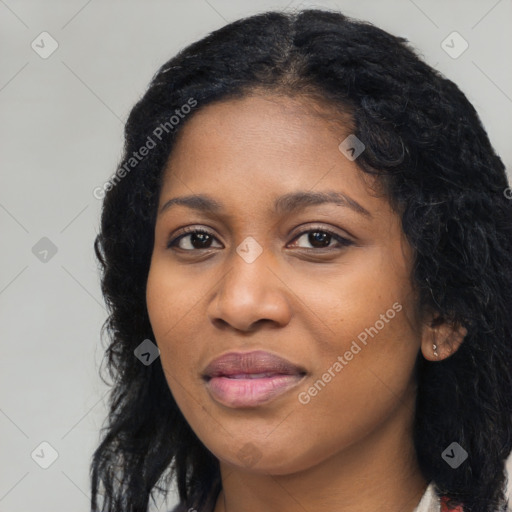 Joyful black young-adult female with long  black hair and brown eyes