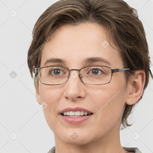 Joyful white adult female with short  brown hair and grey eyes