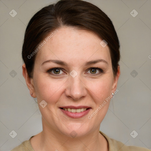 Joyful white adult female with medium  brown hair and grey eyes