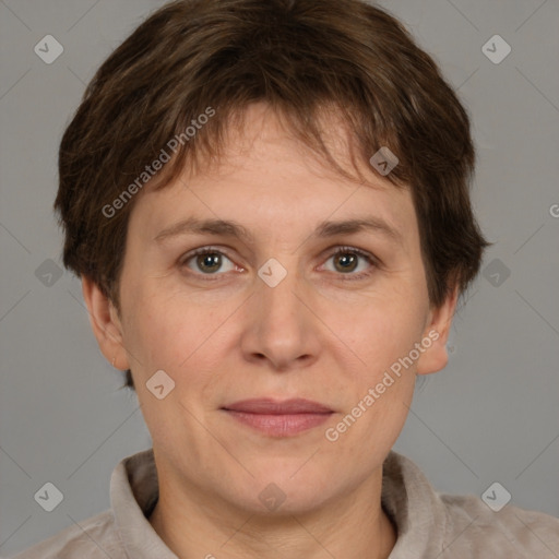 Joyful white adult female with short  brown hair and brown eyes