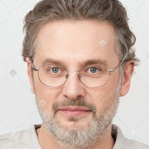 Joyful white adult male with short  brown hair and grey eyes