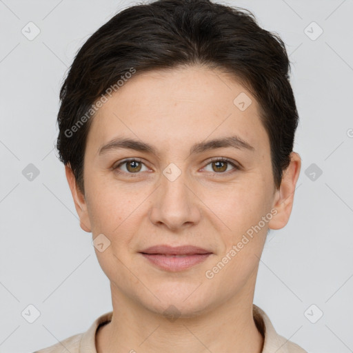 Joyful white young-adult female with short  brown hair and brown eyes