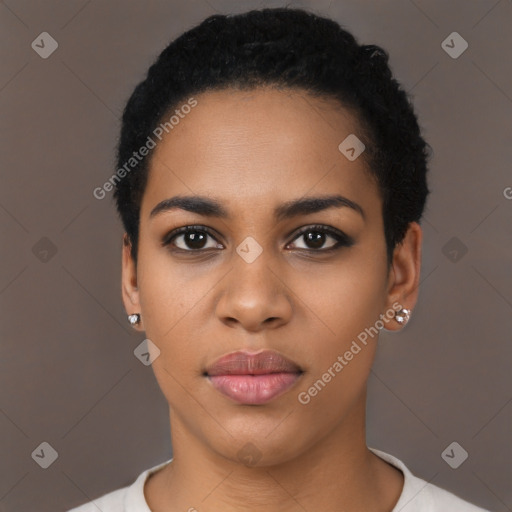 Joyful latino young-adult female with short  black hair and brown eyes