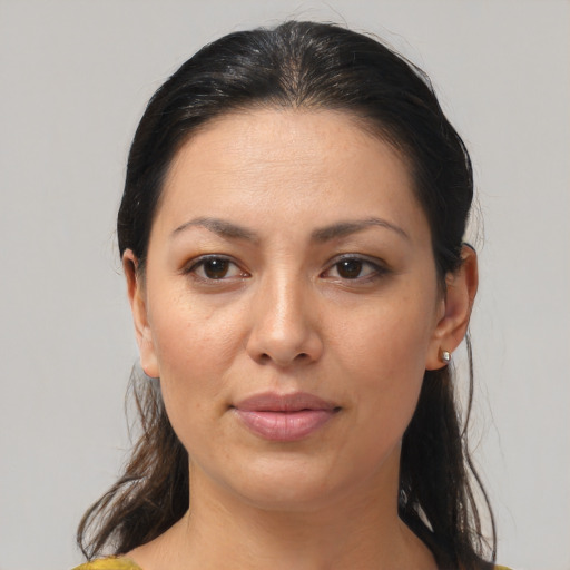 Joyful white young-adult female with medium  brown hair and brown eyes