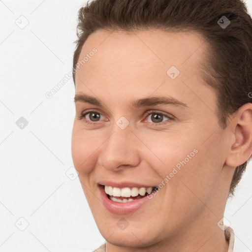 Joyful white young-adult female with short  brown hair and brown eyes