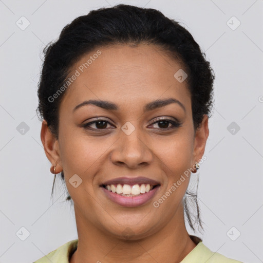 Joyful latino young-adult female with short  brown hair and brown eyes