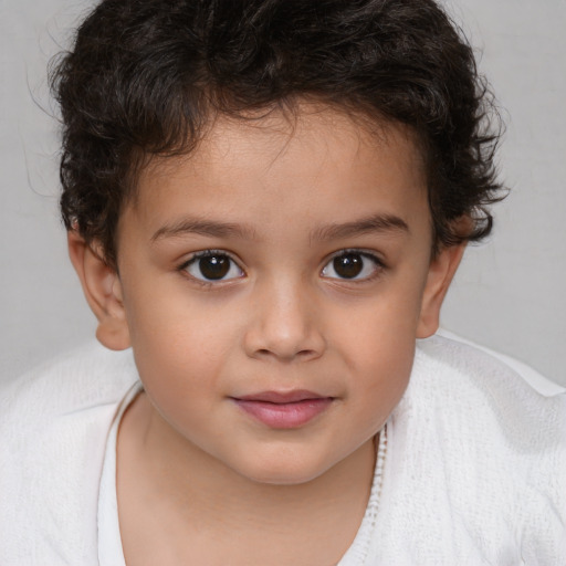 Joyful white child female with short  brown hair and brown eyes