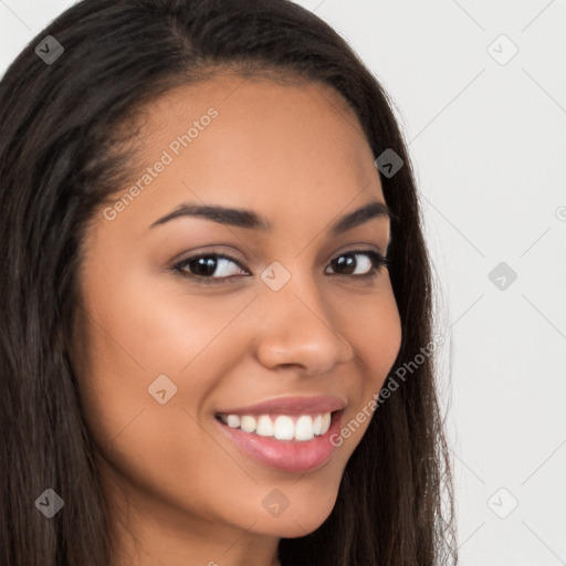 Joyful latino young-adult female with long  brown hair and brown eyes