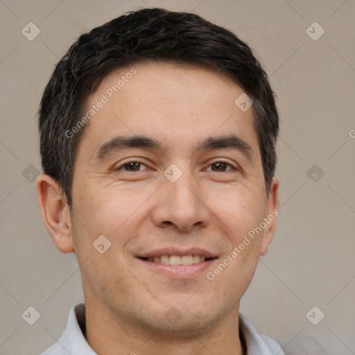 Joyful white adult male with short  brown hair and brown eyes