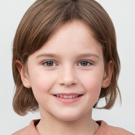 Joyful white child female with medium  brown hair and grey eyes