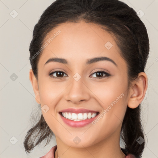 Joyful white young-adult female with long  brown hair and brown eyes