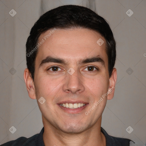 Joyful white young-adult male with short  black hair and brown eyes