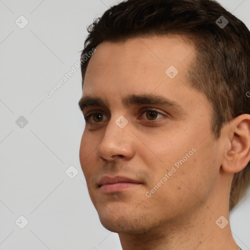 Neutral white young-adult male with short  brown hair and brown eyes