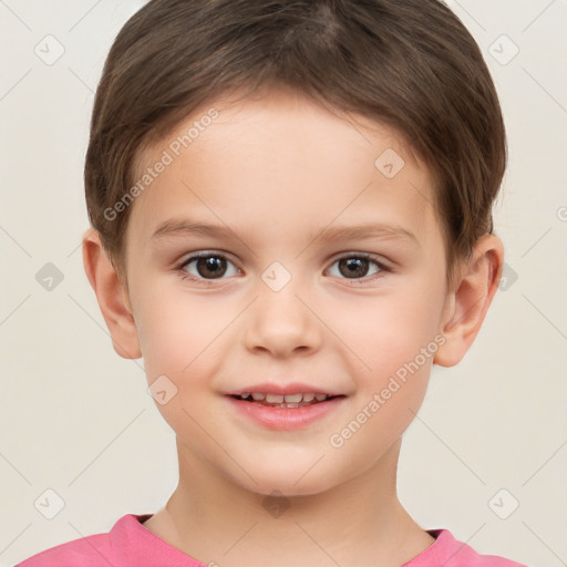 Joyful white child male with short  brown hair and brown eyes