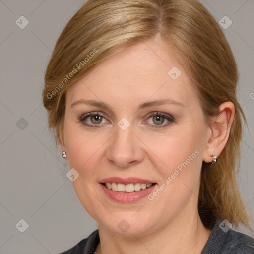 Joyful white young-adult female with medium  brown hair and blue eyes