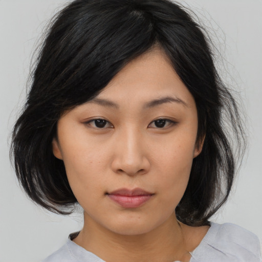 Neutral asian young-adult female with medium  black hair and brown eyes