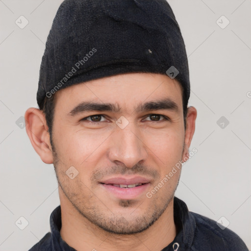 Joyful white young-adult male with short  black hair and brown eyes